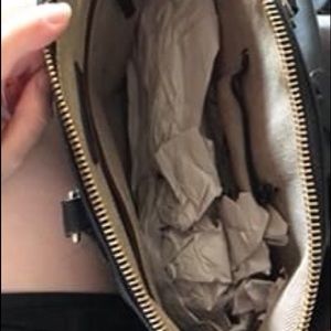 Dooney and Bourke Florentine Vachetta Leather